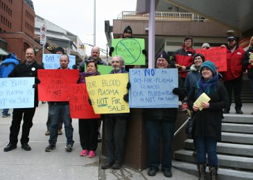 Healthcare activists hold information picket on pay-for-plasma clinics